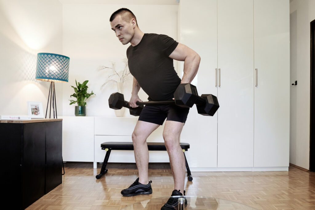 Convert dumbbells into barbell for home gym use