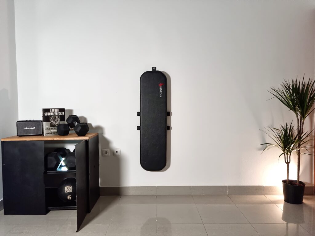 tylish black foldable weight bench with durable, high-quality build and storage solution